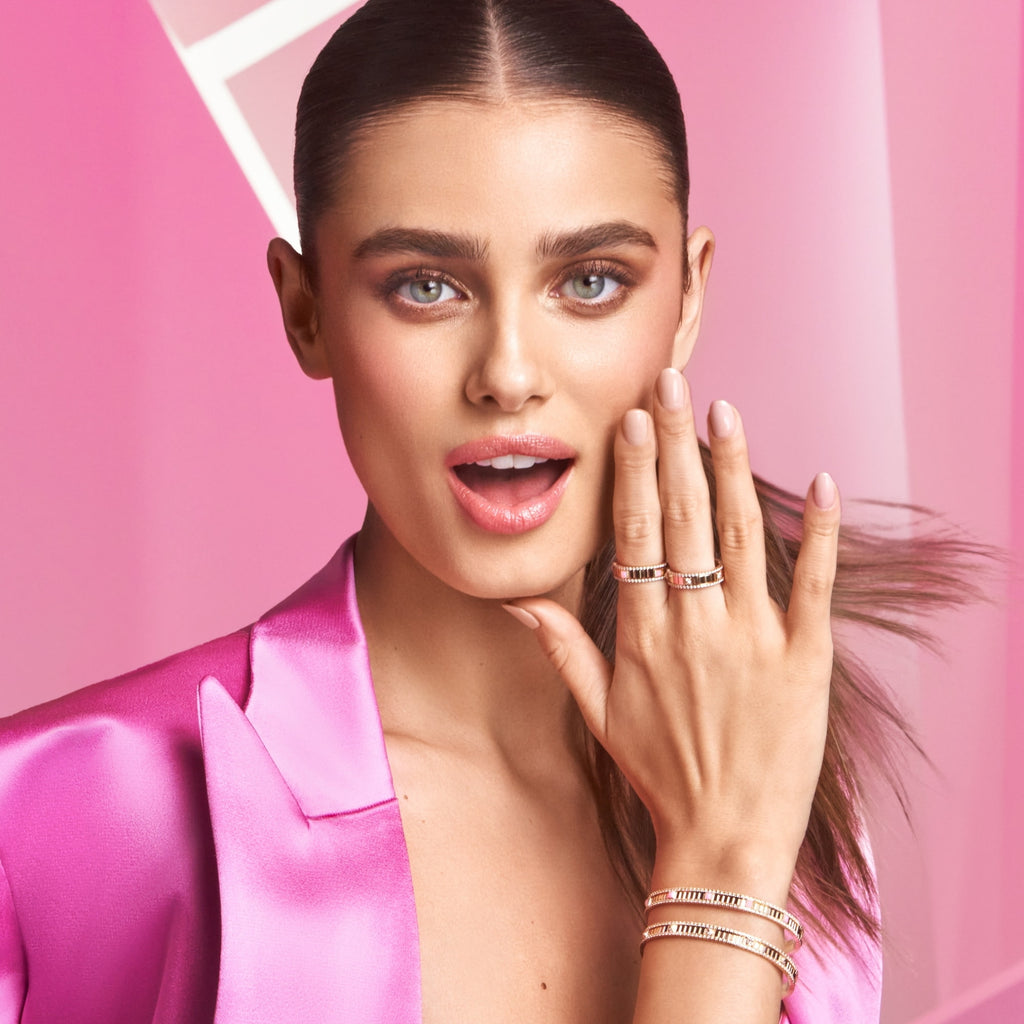 Taylor Hill gasping in a pink blazer
