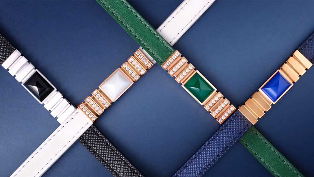 leather bracelets in black, white, green and navy cross over each other forming a diamond pattern
