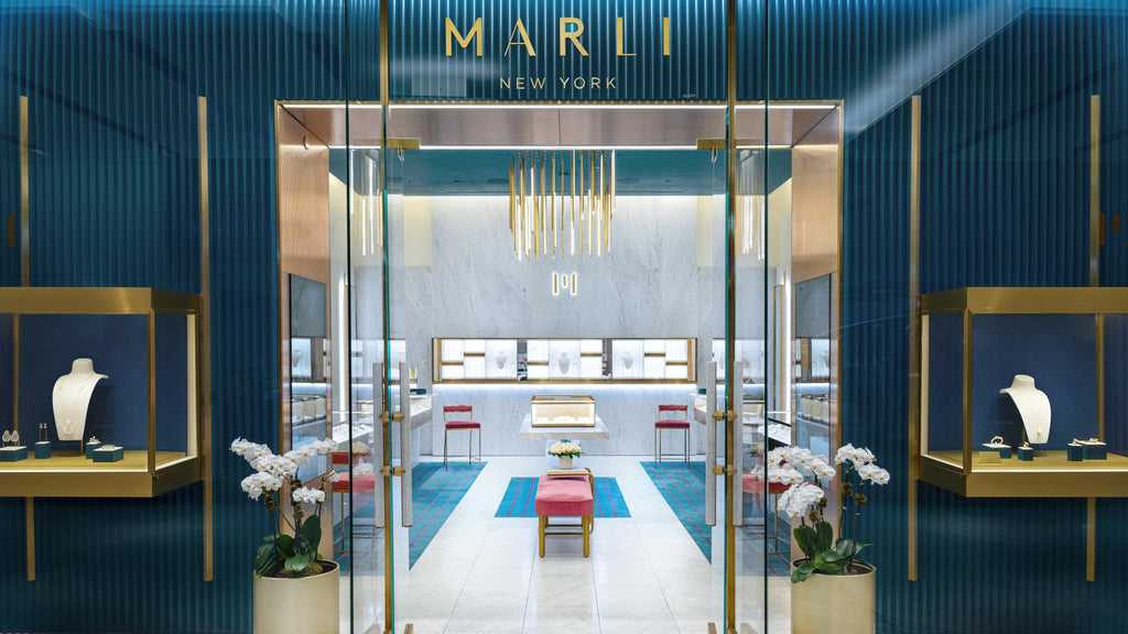 MARLI New York store interior with blue walls and gold accents