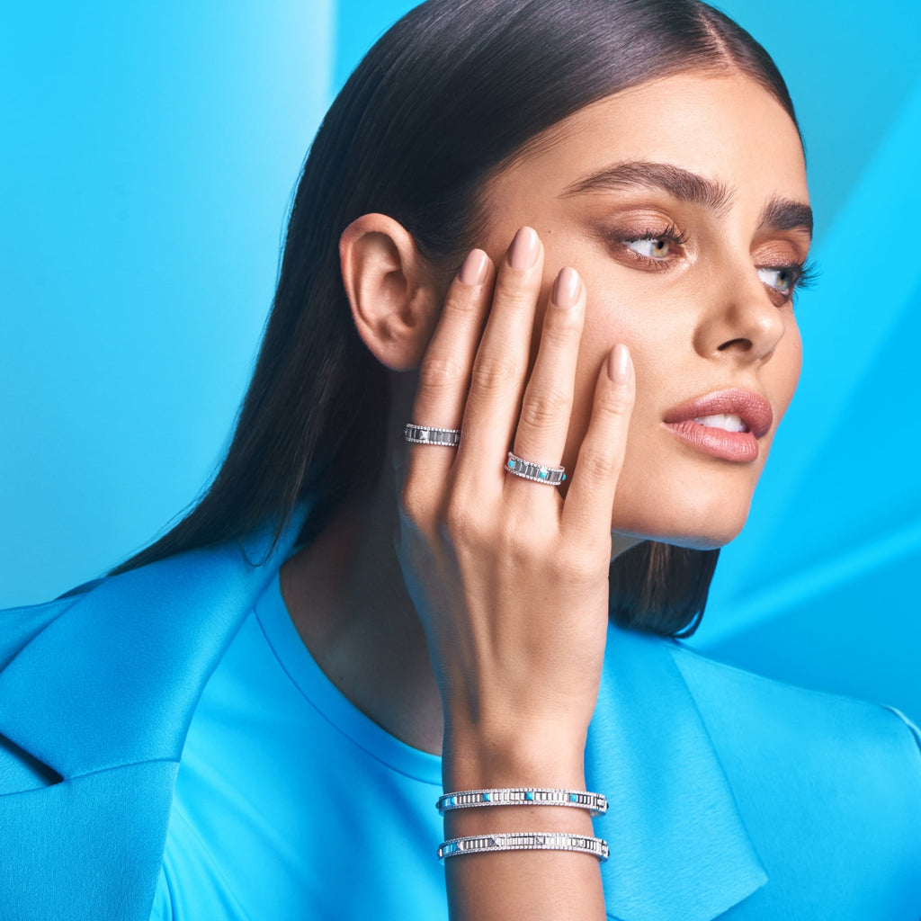Taylor Hill wearing blue with Marli's Life Jewelry collection